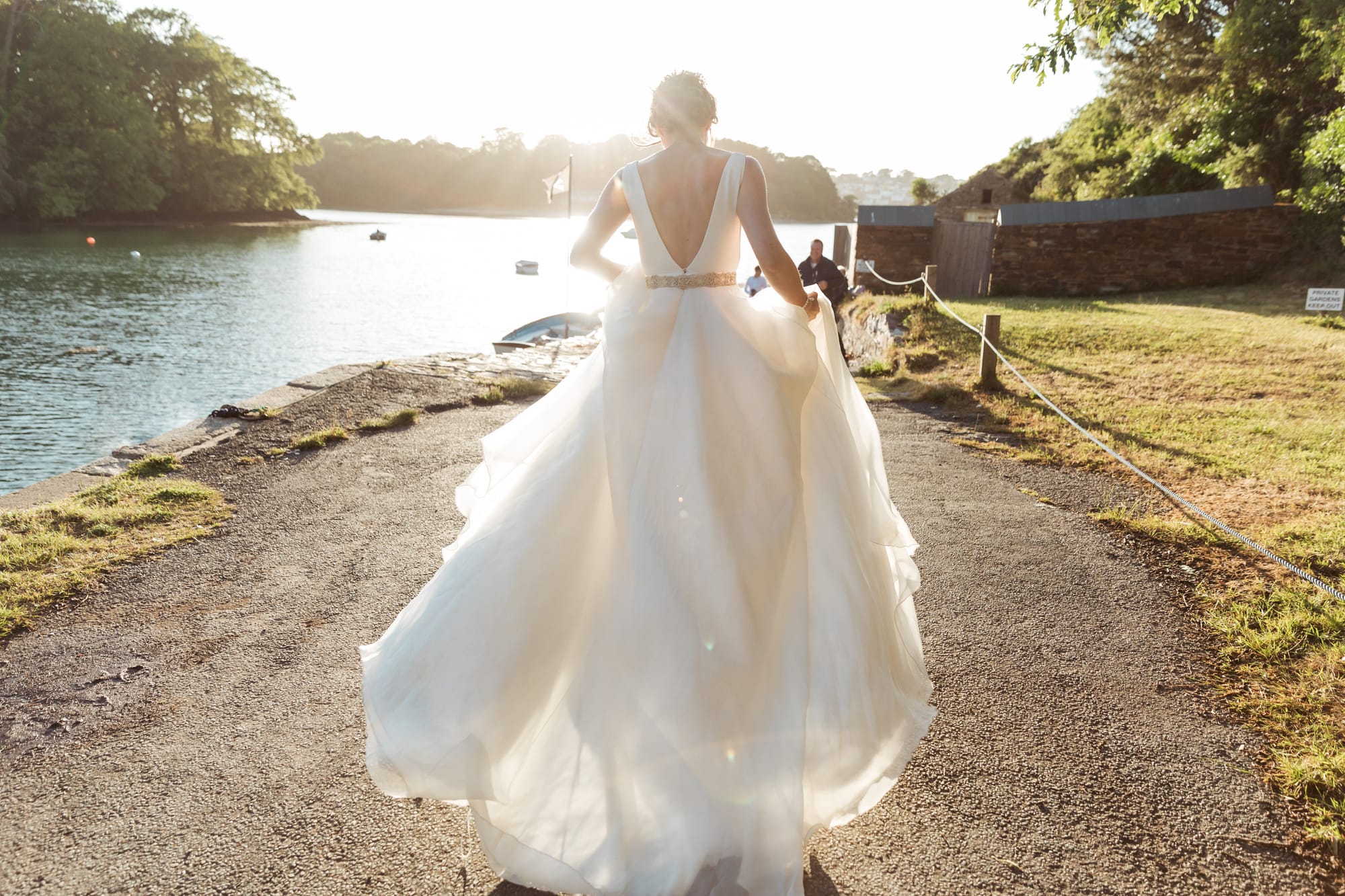 A dress doesn't need a face to carry a picture. Sometimes it carries more without one.